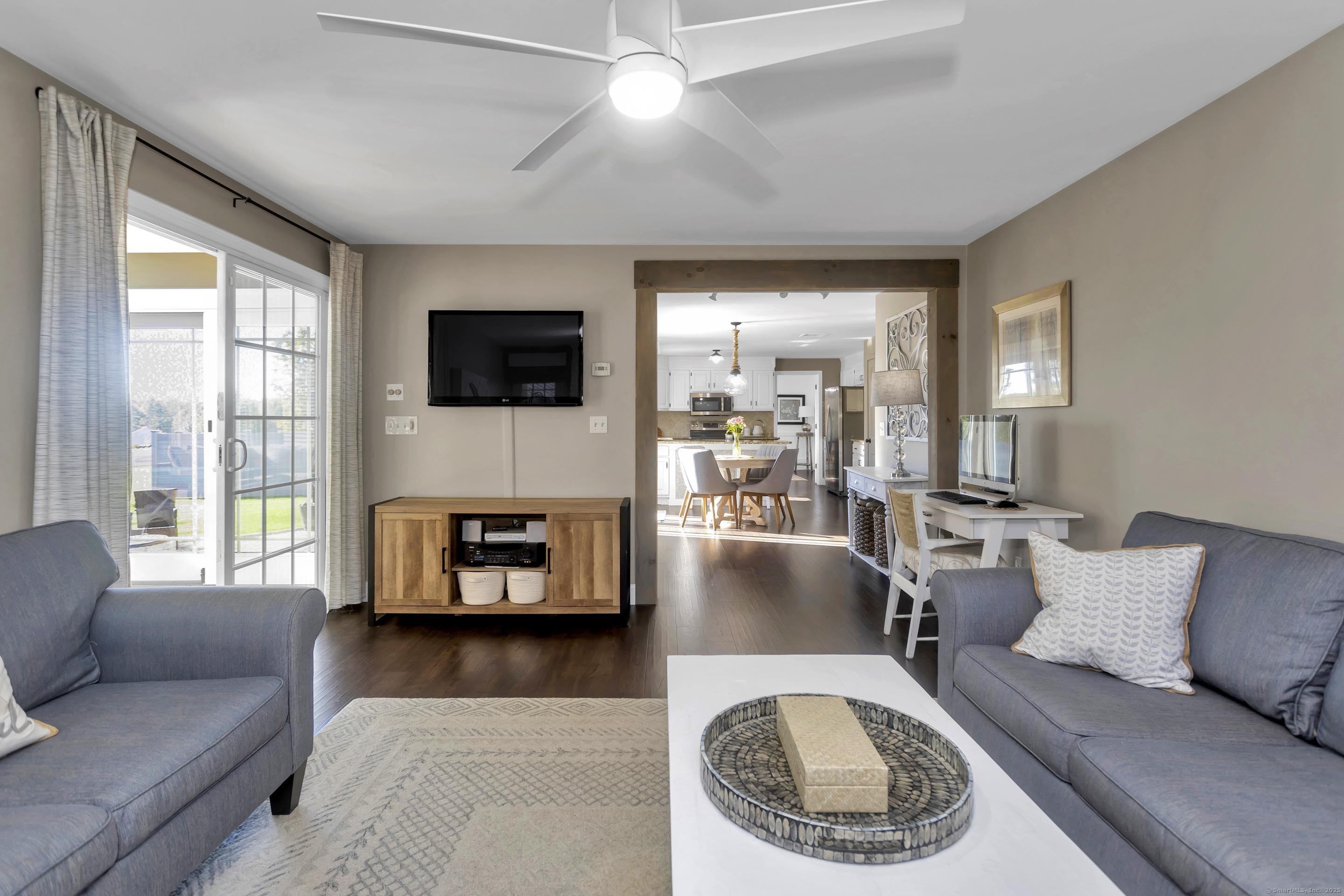 57 Kildeer Lane Suffield, CT 06078 - Photo 16 of 37 a living room with furniture and a flat screen tv