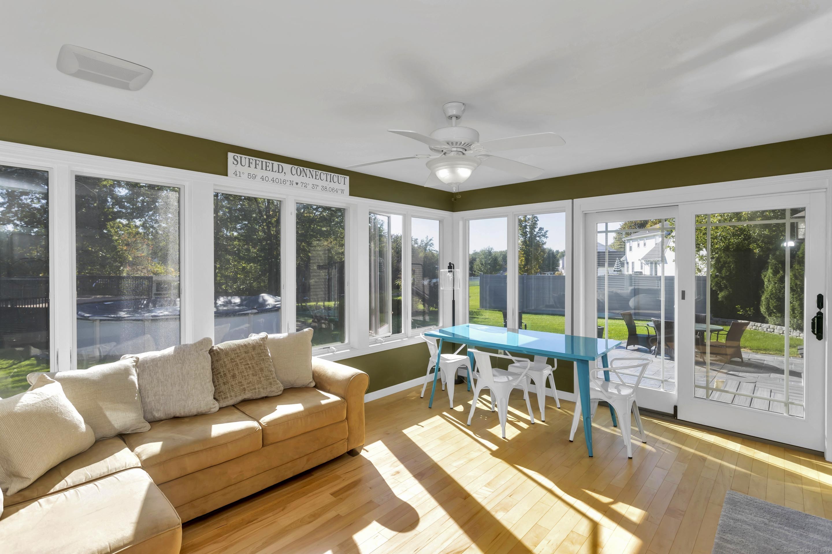 57 Kildeer Lane Suffield, CT 06078 - Photo 19 of 37 a living room with furniture and a large window