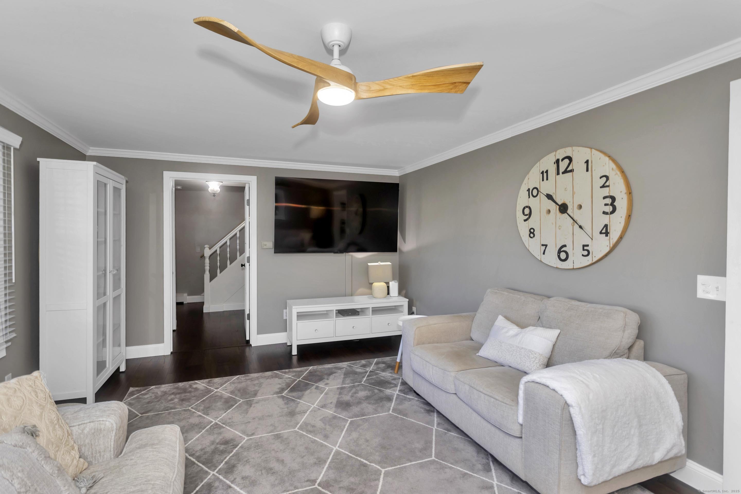 57 Kildeer Lane Suffield, CT 06078 - Photo 22 of 37 a living room with furniture and a large window