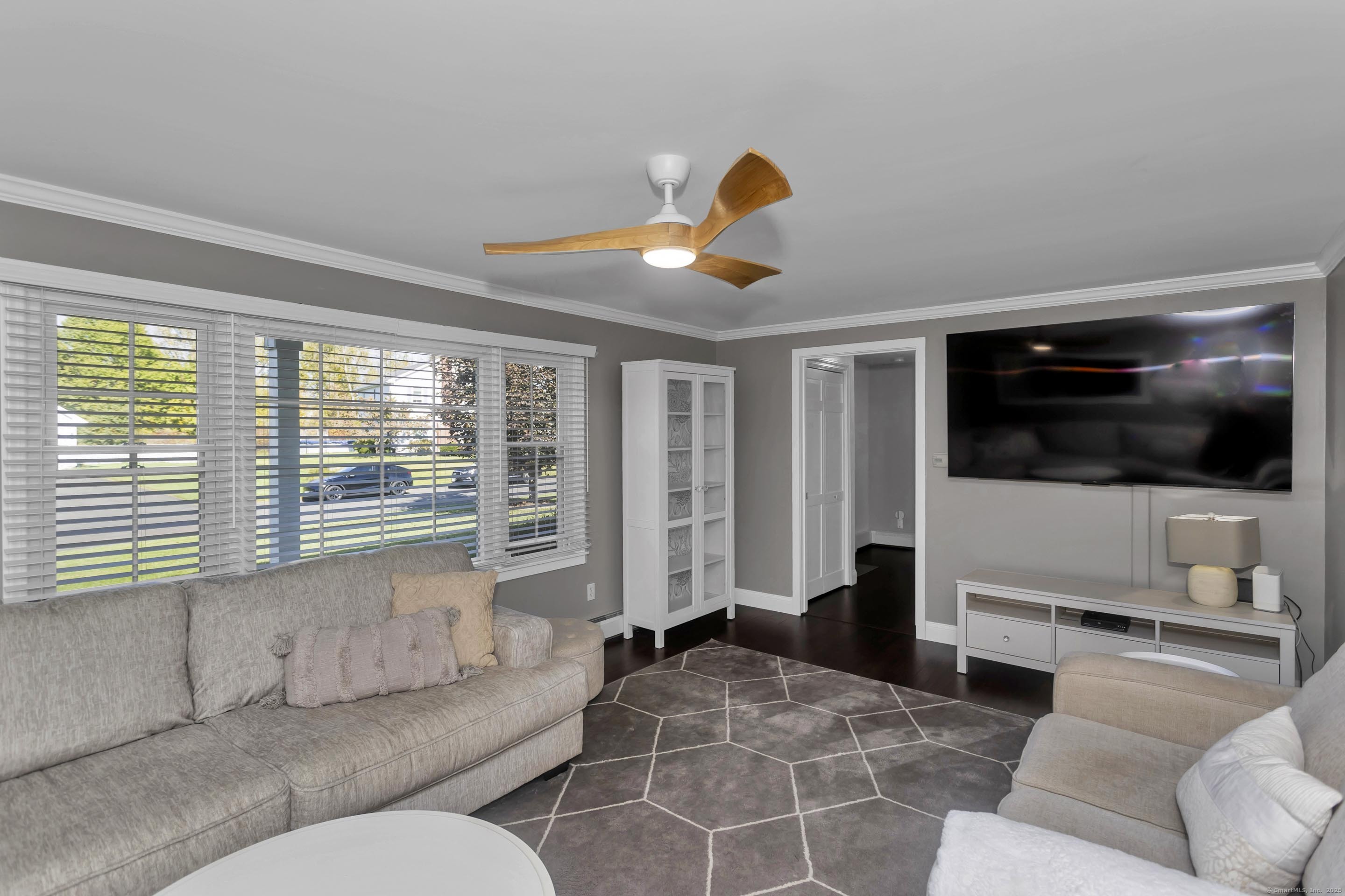 57 Kildeer Lane Suffield, CT 06078 - Photo 23 of 37 a living room with furniture and a flat screen tv