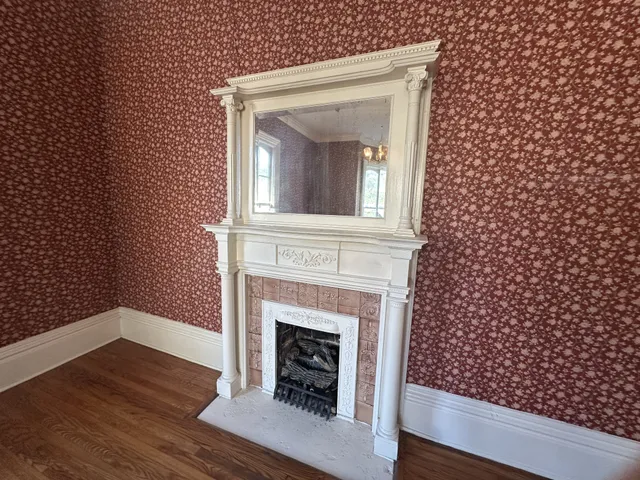 a view of a livingroom with wooden floor
