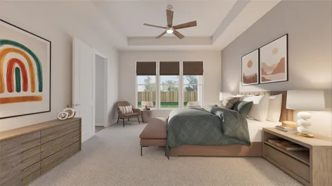 a spacious bedroom with a bed a couch and large window