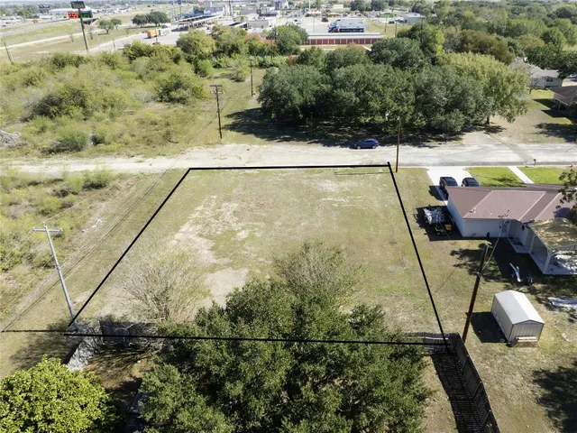 a view of swimming pool from a yard