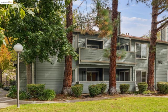 a front view of a house with yard