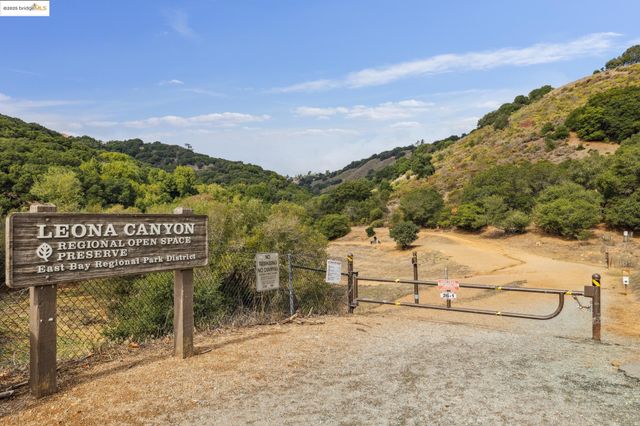 a view of a road with mountains in the background