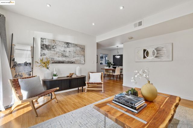 a living room with furniture and rug