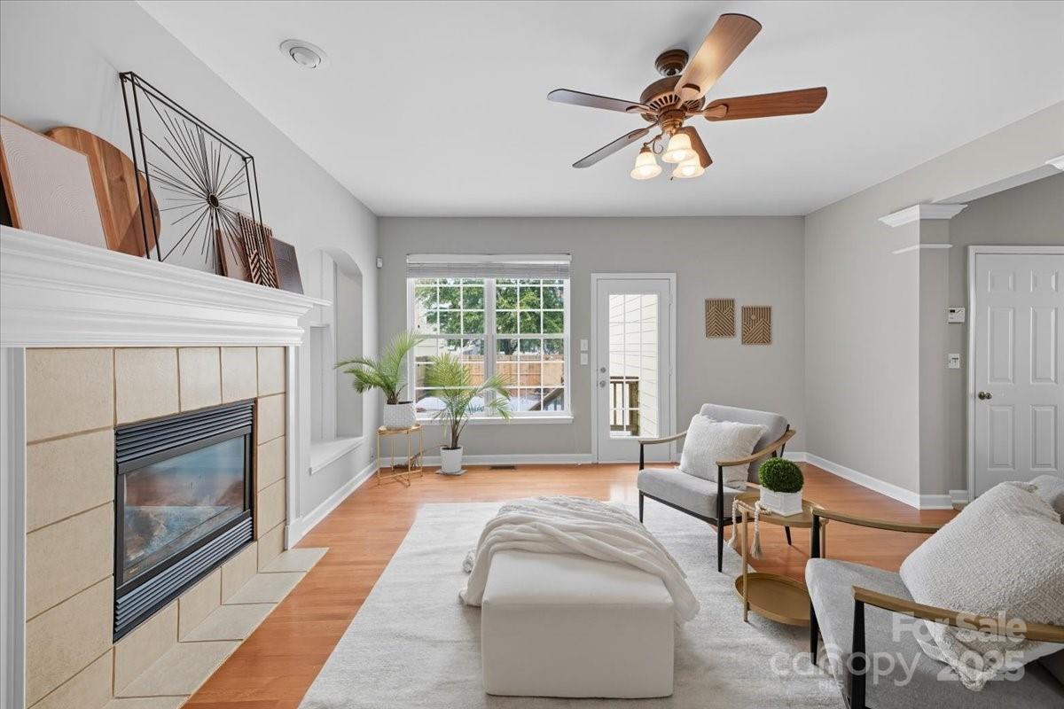 17005 Carlton Way Road Huntersville, NC 28078 - Photo 12 of 45 a living room with furniture and a fireplace