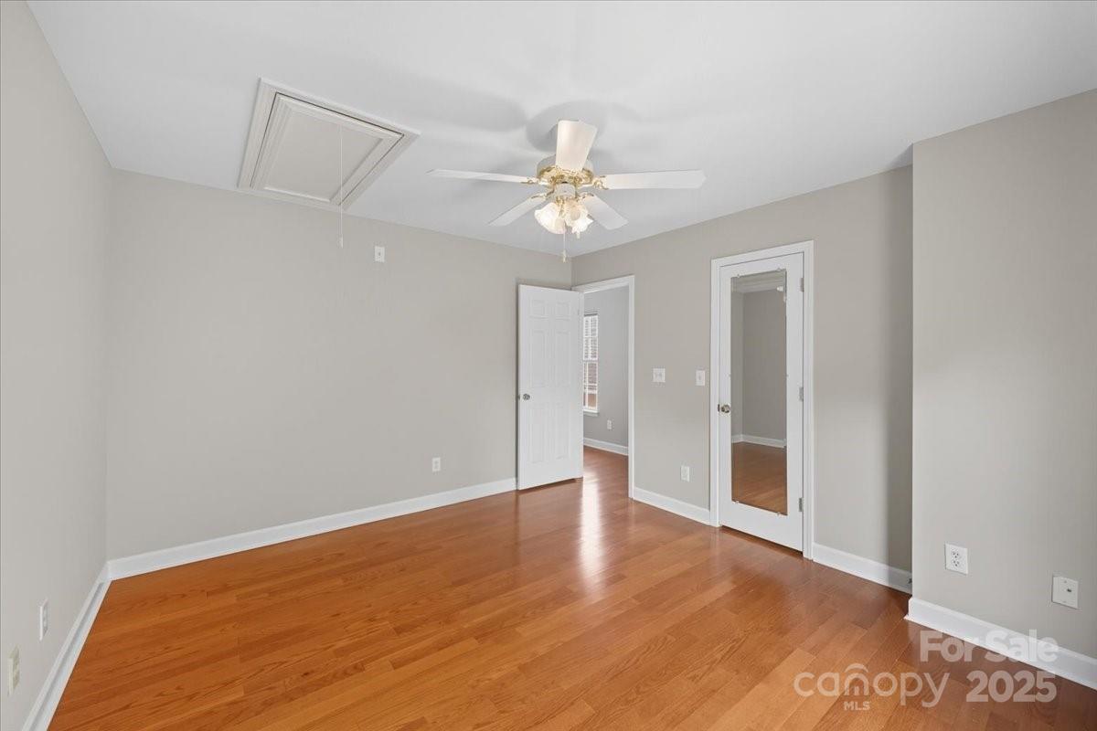 17005 Carlton Way Road Huntersville, NC 28078 - Photo 28 of 45 wooden floor in an empty room with a window