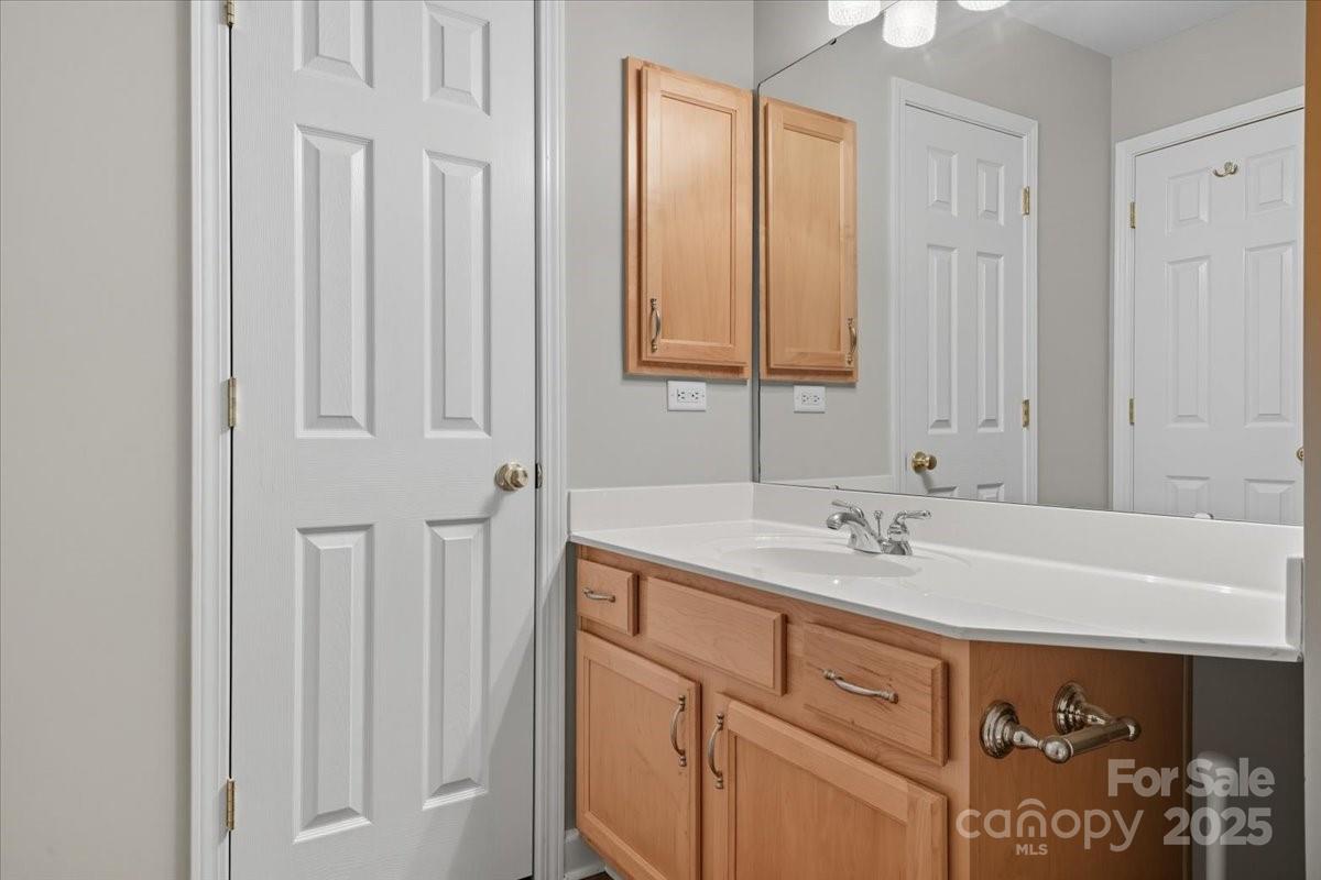 17005 Carlton Way Road Huntersville, NC 28078 - Photo 29 of 45 a bathroom with a sink and a mirror
