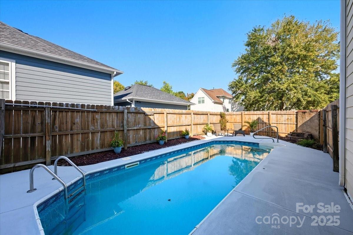 17005 Carlton Way Road Huntersville, NC 28078 - Photo 39 of 45 a view of a swimming pool with a lounge chair