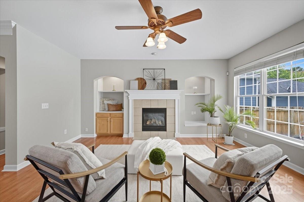 17005 Carlton Way Road Huntersville, NC 28078 - Photo 10 of 45 a living room with furniture and a fireplace