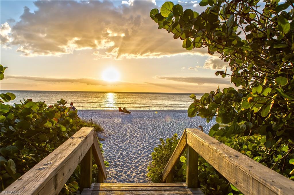 25 St Sw Naples Naples, FL 34117 - Photo 6 of 12 a view of outside space and ocean view