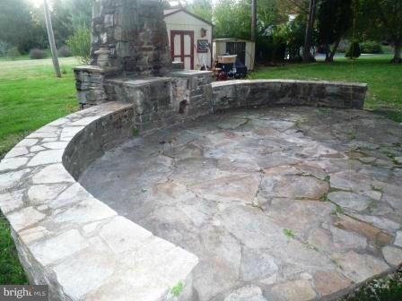 725 Milldam Road Towson, MD 21286 - Photo 5 of 21 a view of a backyard with a garden