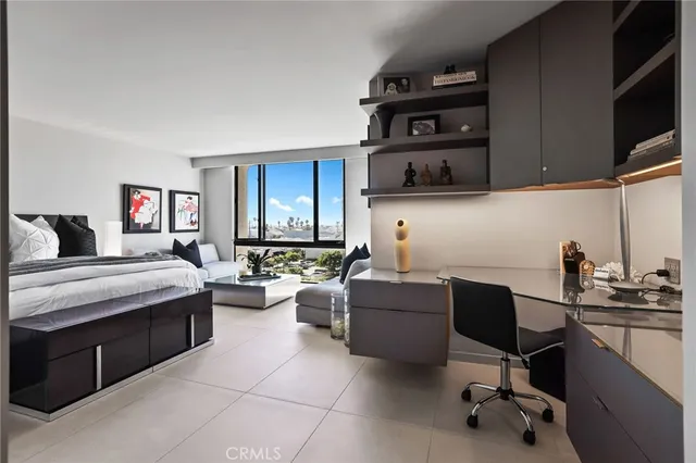 a kitchen with a stove cabinets and a sink