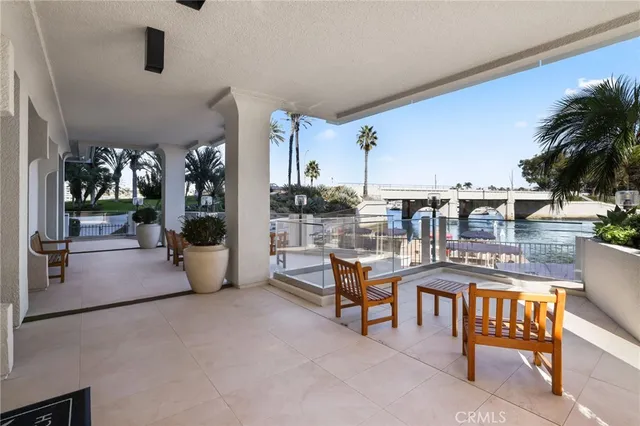 a view of a living room and kitchen