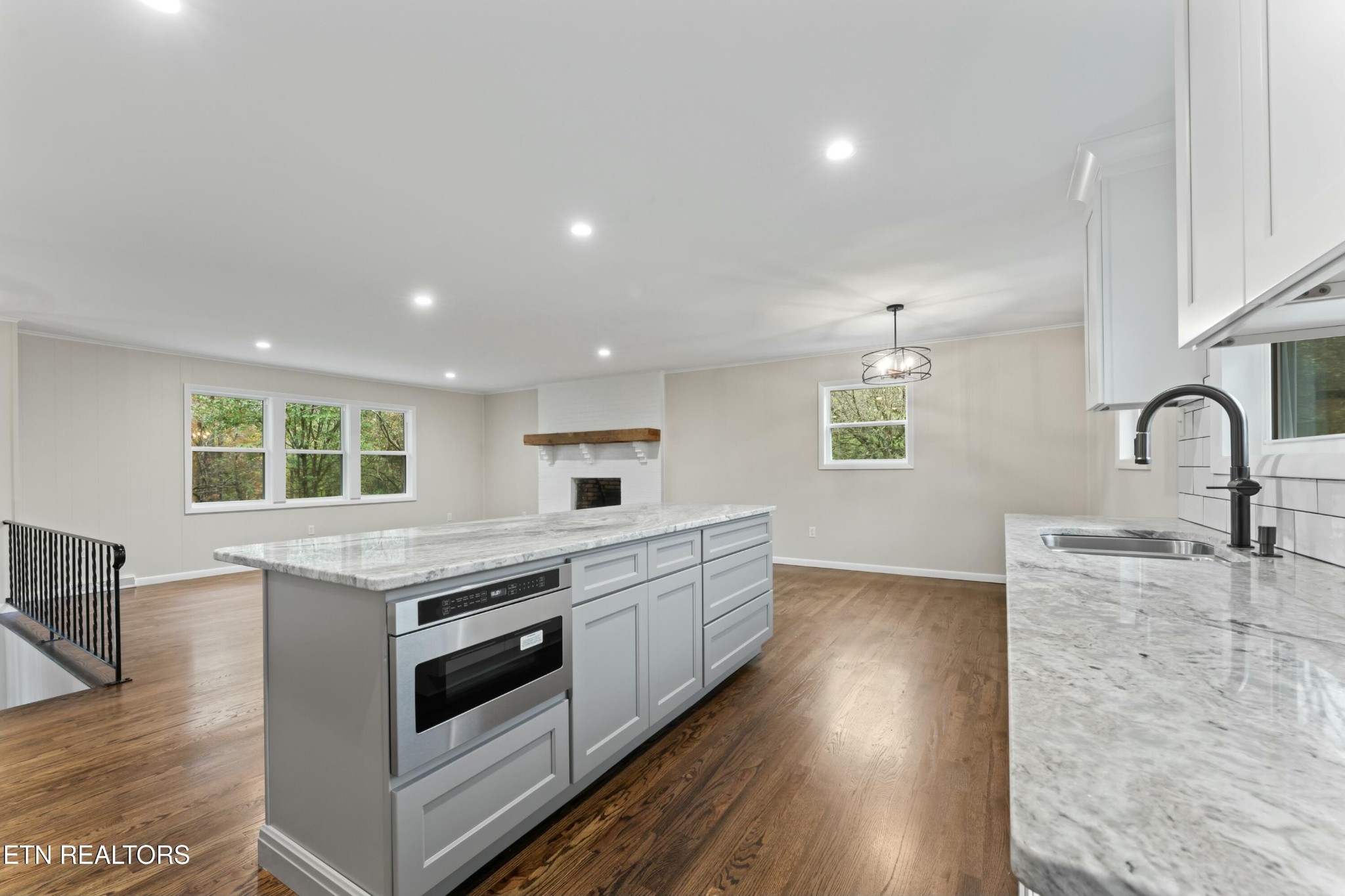 2229 Tooles Bend Road Knoxville, TN 37922 - Photo 12 of 41 a kitchen with stainless steel appliances granite countertop a sink and stove
