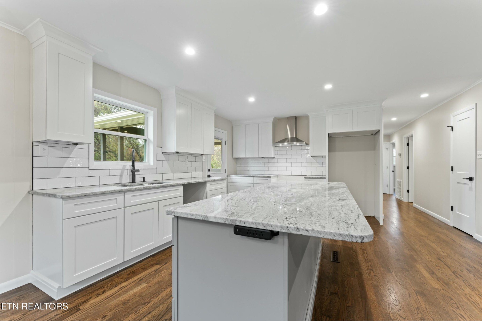2229 Tooles Bend Road Knoxville, TN 37922 - Photo 14 of 41 a kitchen with kitchen island sink stove and refrigerator