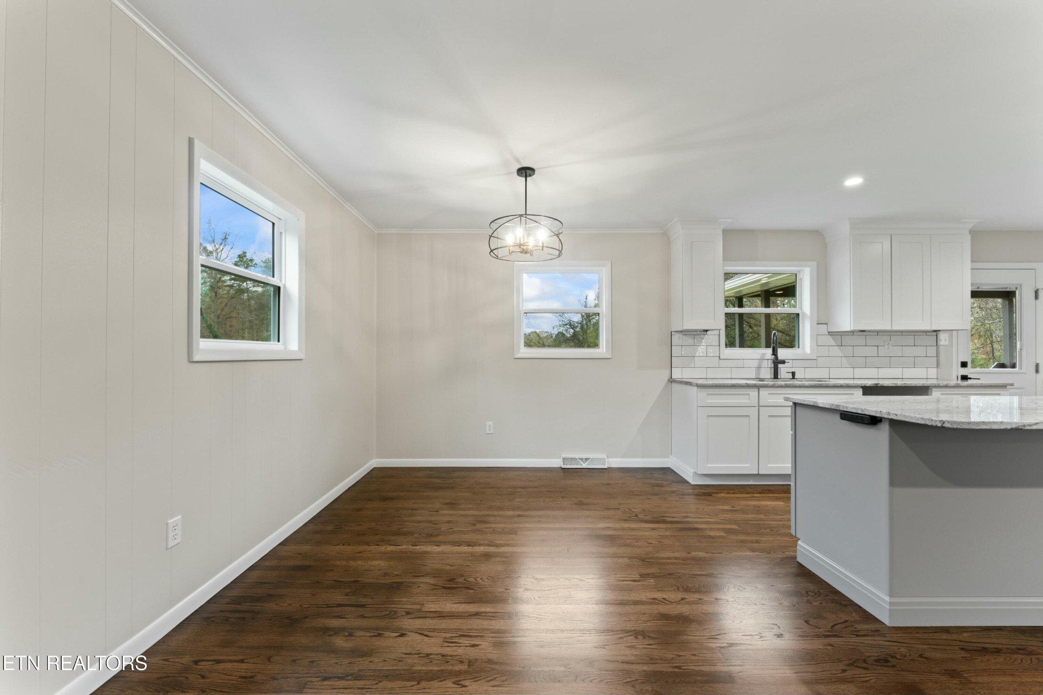 2229 Tooles Bend Road Knoxville, TN 37922 - Photo 15 of 41 a view of a kitchen with wooden floor and a sink
