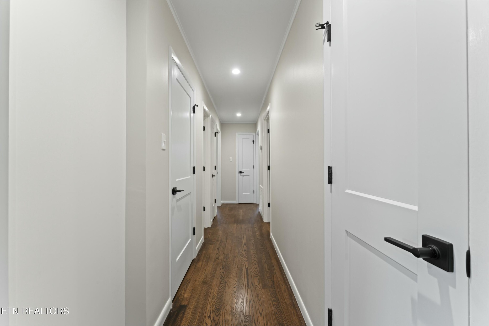 2229 Tooles Bend Road Knoxville, TN 37922 - Photo 16 of 41 a view of a hallway with wooden floor and a shower