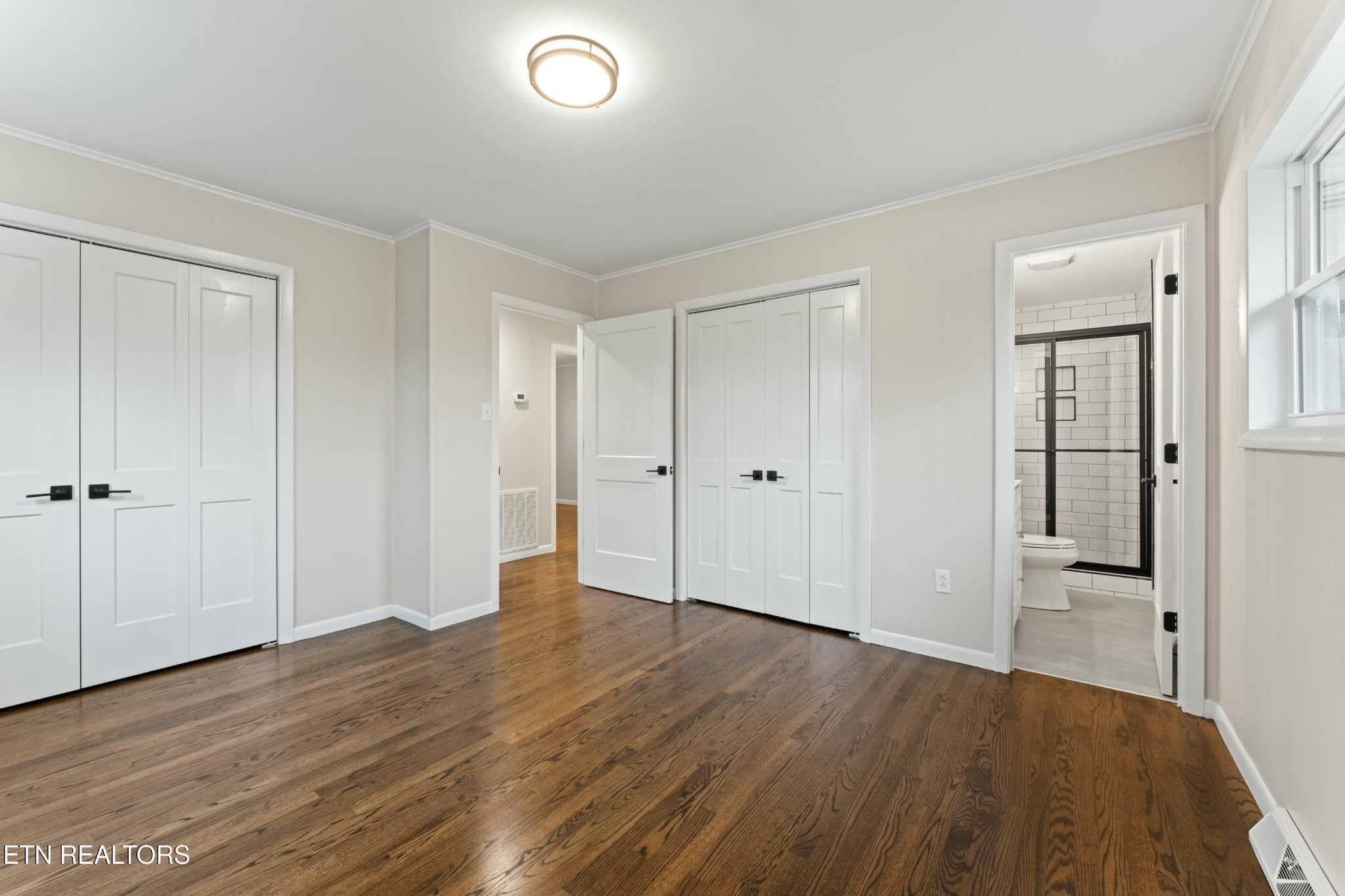 2229 Tooles Bend Road Knoxville, TN 37922 - Photo 17 of 41 a view of an empty room with wooden floor