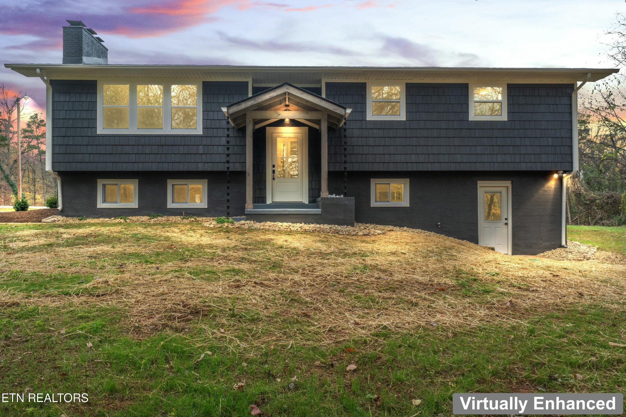 2229 Tooles Bend Road Knoxville, TN 37922 - Photo 2 of 41 a front view of a house with a garden