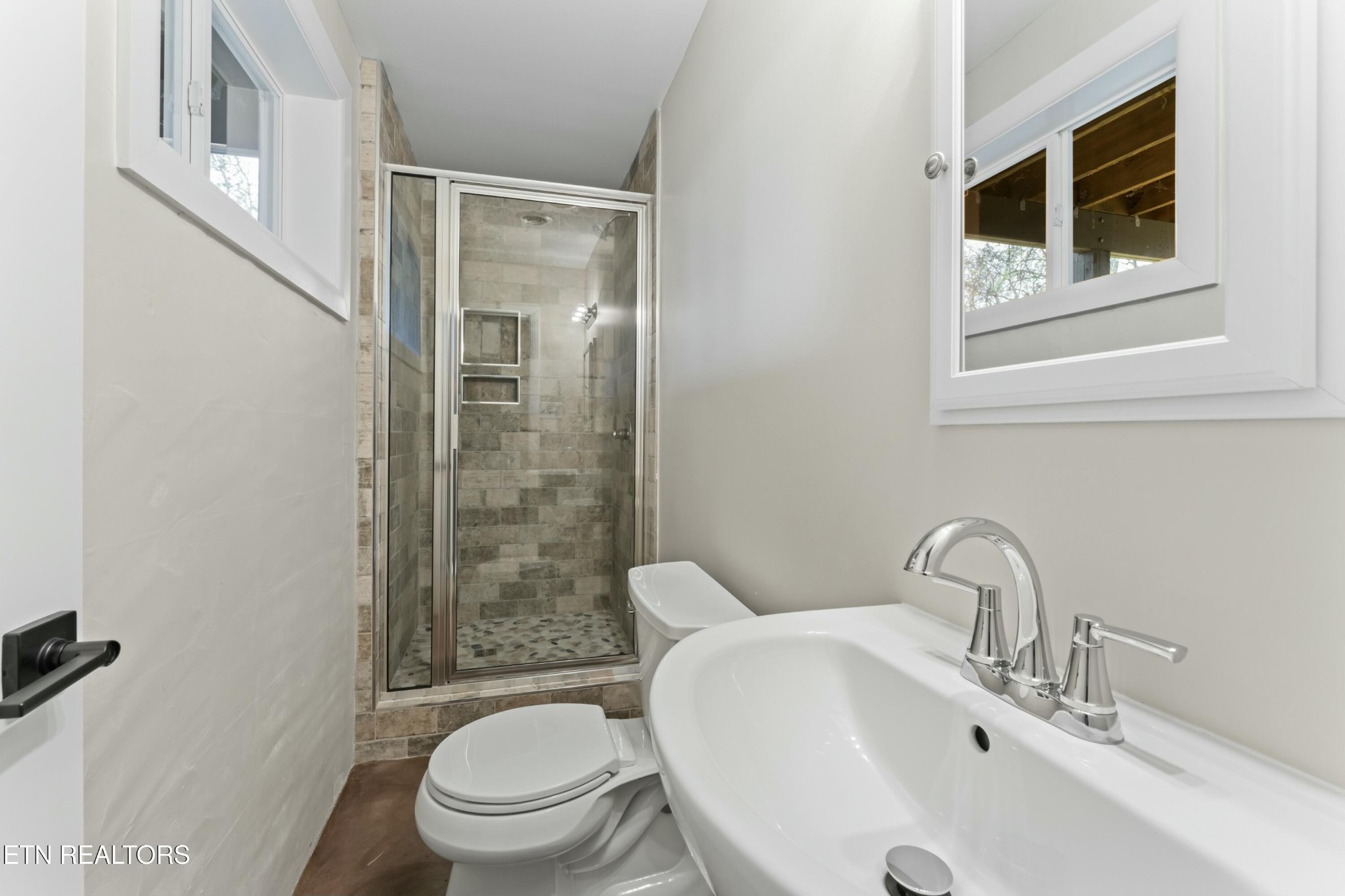 2229 Tooles Bend Road Knoxville, TN 37922 - Photo 30 of 41 a bathroom with a sink toilet and shower