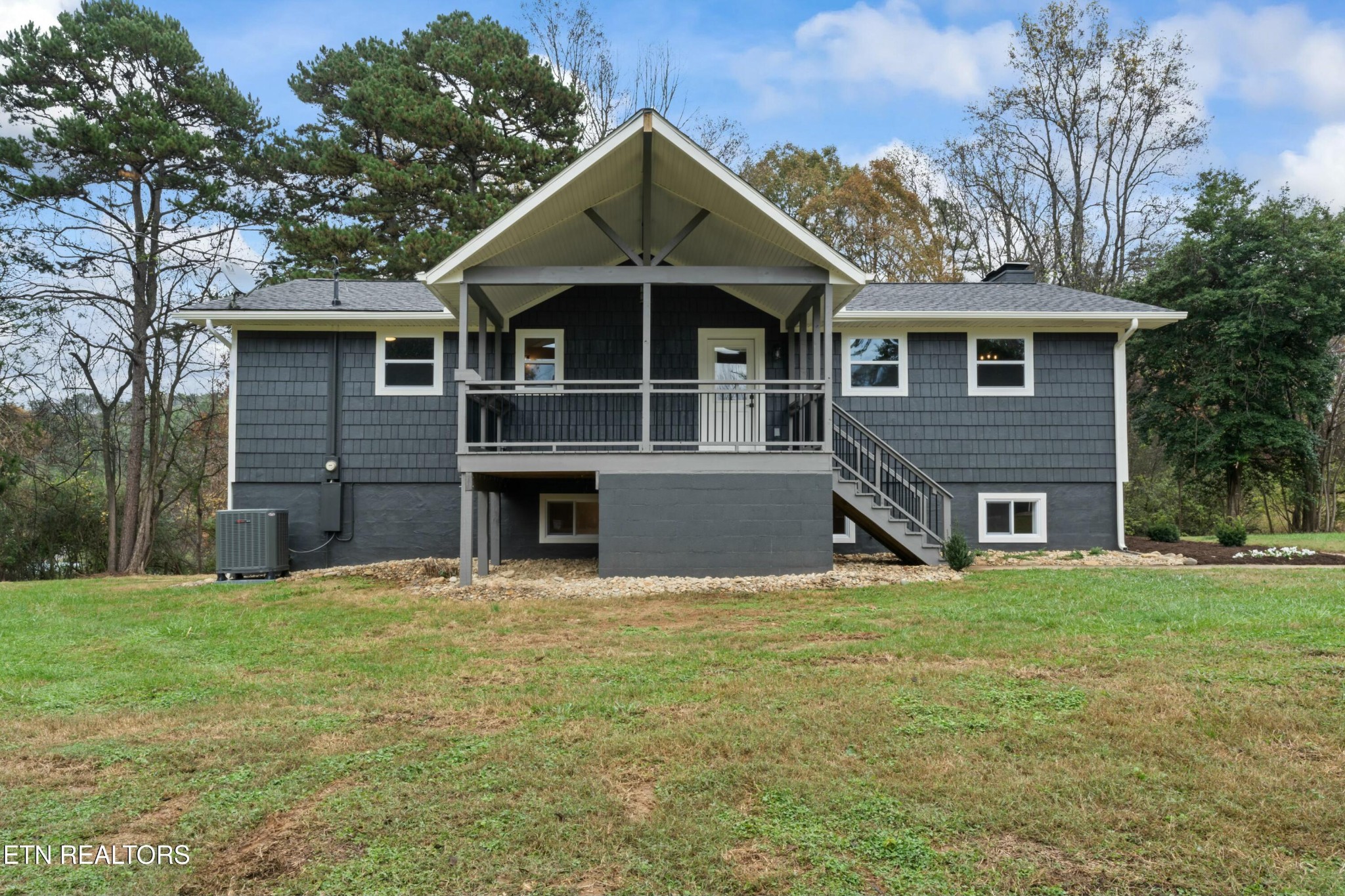 2229 Tooles Bend Road Knoxville, TN 37922 - Photo 5 of 41 a front view of a house with a yard