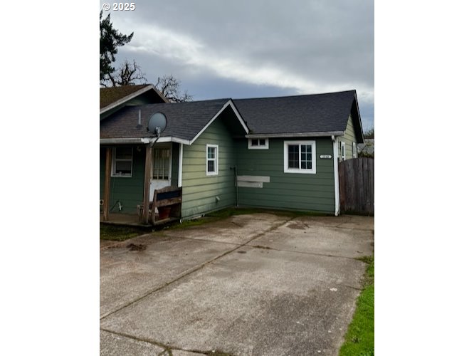 204 Southwest Water Street Sheridan, OR 97378 - Photo 2 of 9 a view of a house with a backyard