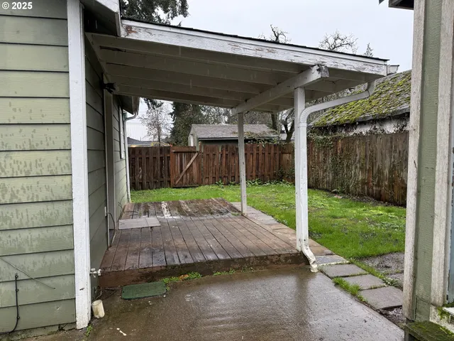 a view of backyard with green space