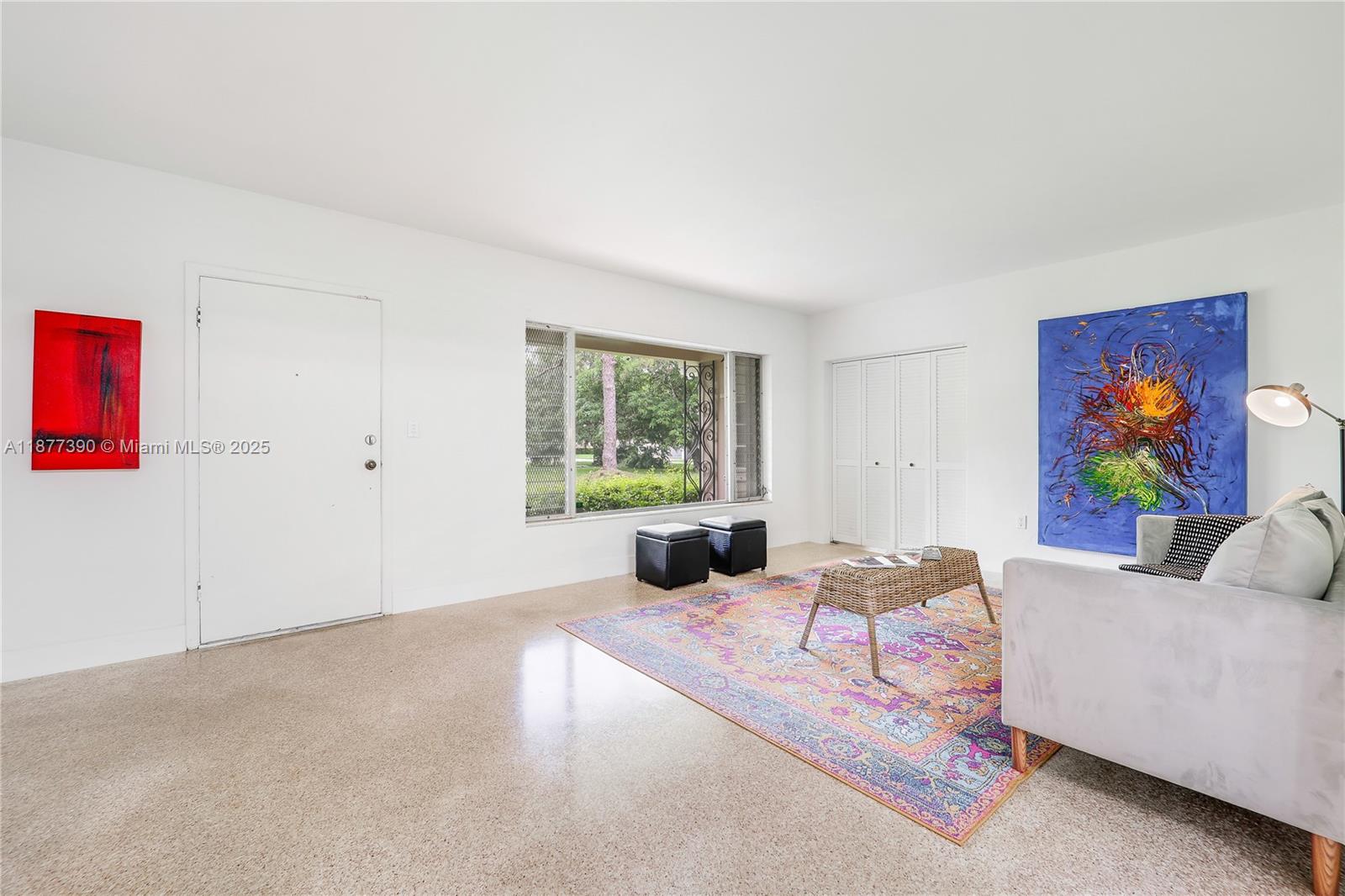 6445 Southwest 46th Terrace Miami, FL 33155 - Photo 3 of 22 a living room with furniture and a window