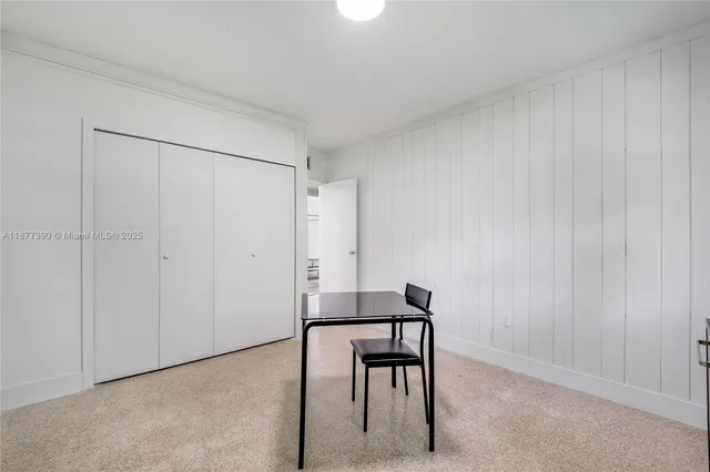 a view of a room with table and chair
