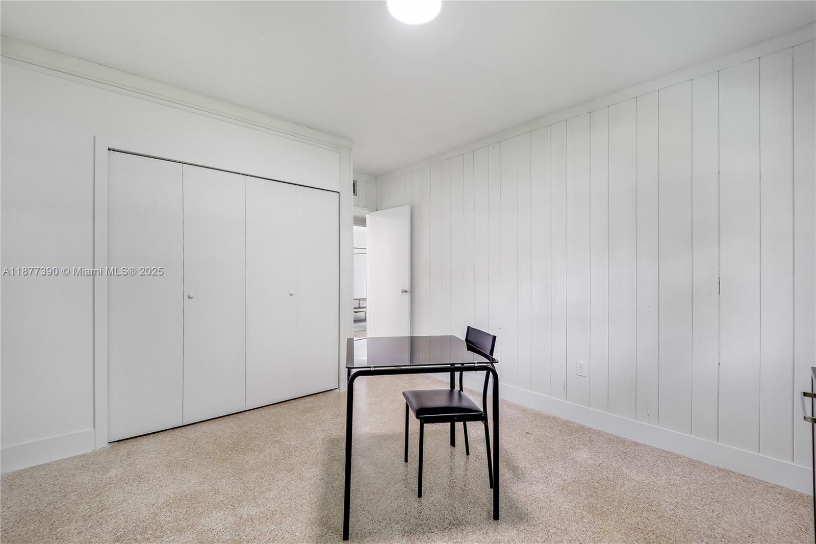 6445 Southwest 46th Terrace Miami, FL 33155 - Photo 9 of 22 a view of a room with table and chair