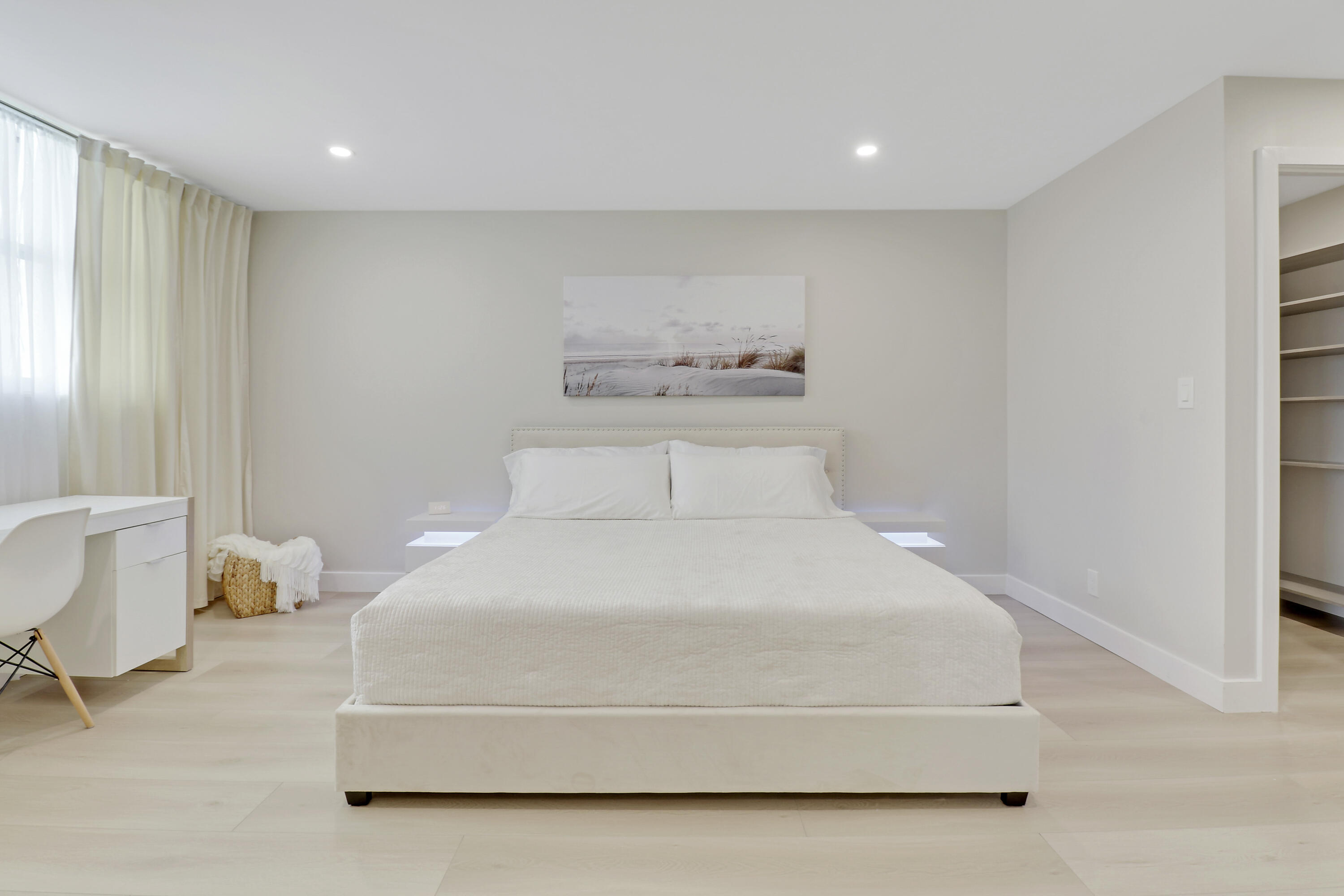 3540 South Ocean Boulevard, Unit 715 South Palm Beach, FL 33480 - Photo 13 of 39 a bedroom with a bed and window