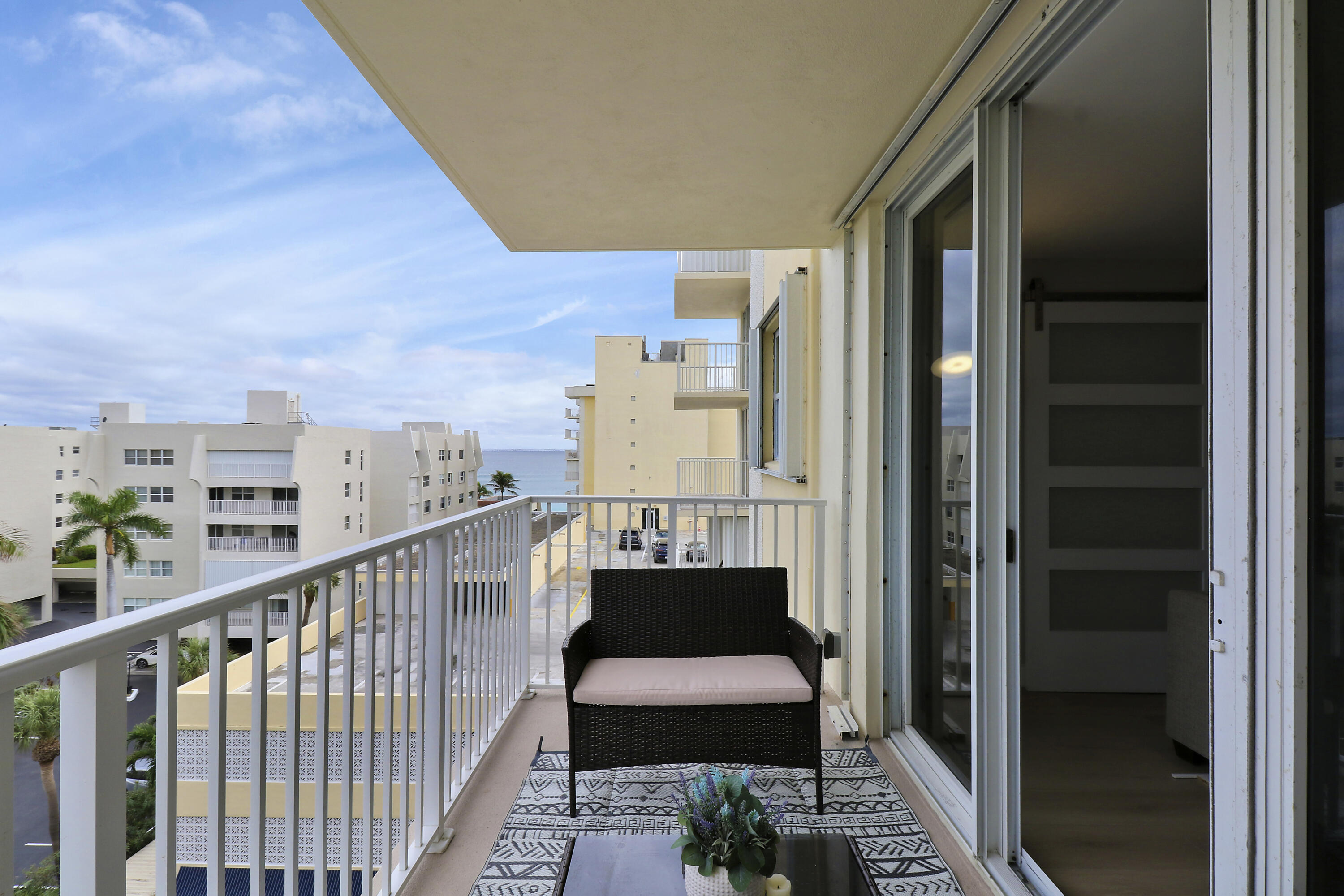 3540 South Ocean Boulevard, Unit 715 South Palm Beach, FL 33480 - Photo 22 of 39 a view of balcony with a potted plant