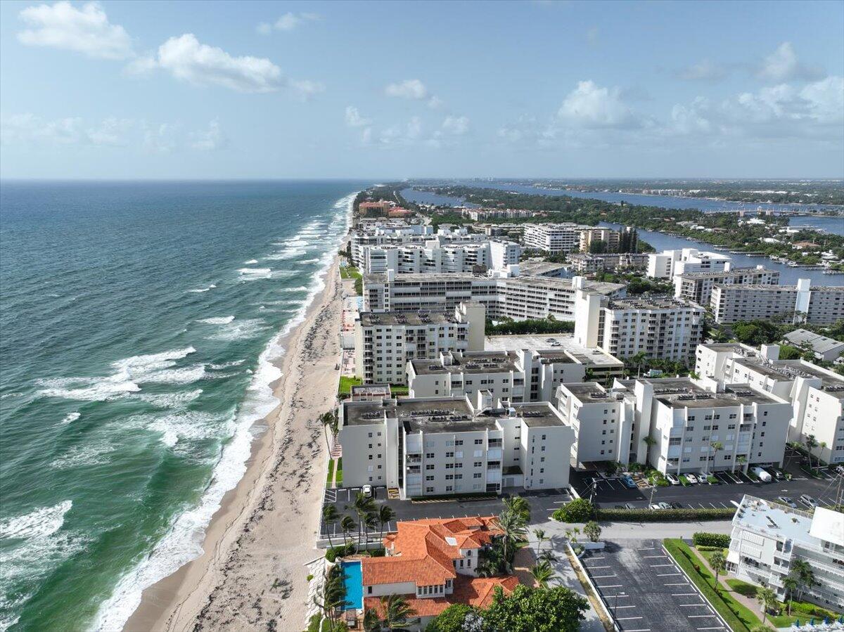 3540 South Ocean Boulevard, Unit 715 South Palm Beach, FL 33480 - Photo 26 of 39 a view of building with yard
