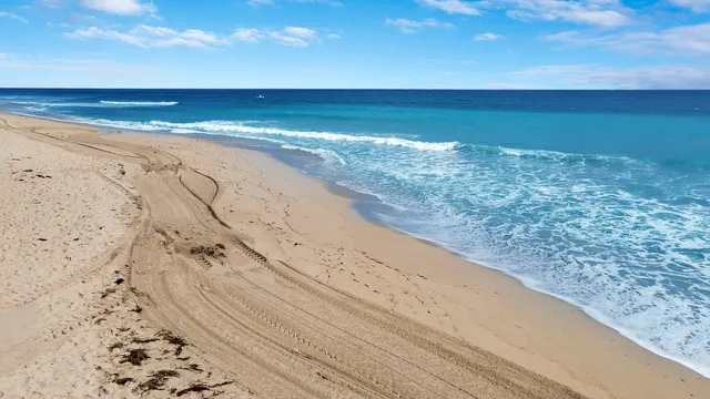 a view of a city with an ocean view