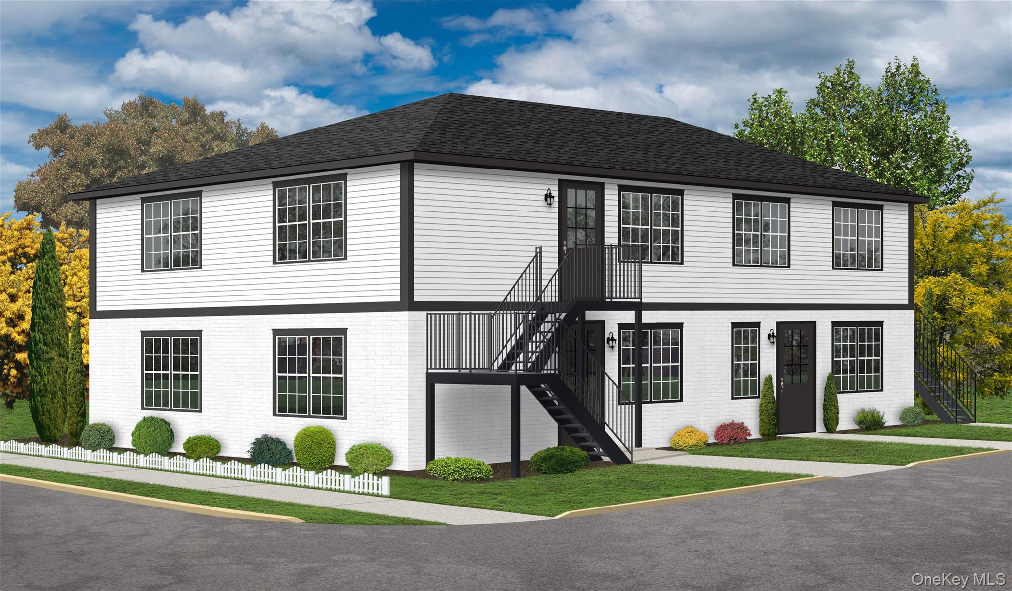 a front view of a house with a garden and plants