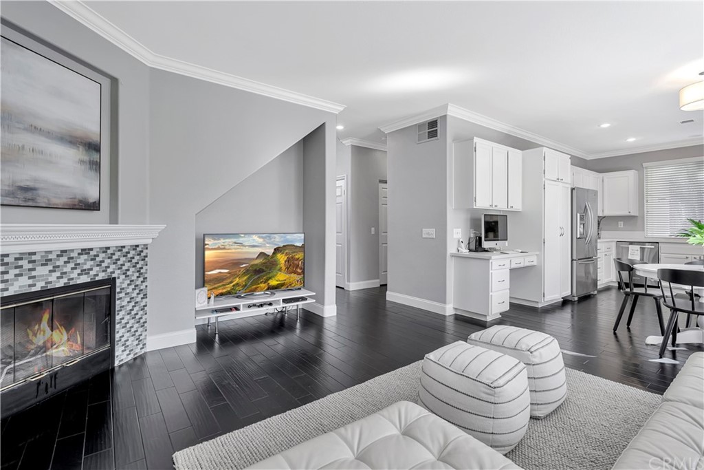 350 Exeter Way Corona, CA 92882 - Photo 16 of 55 a living room with furniture and a fireplace
