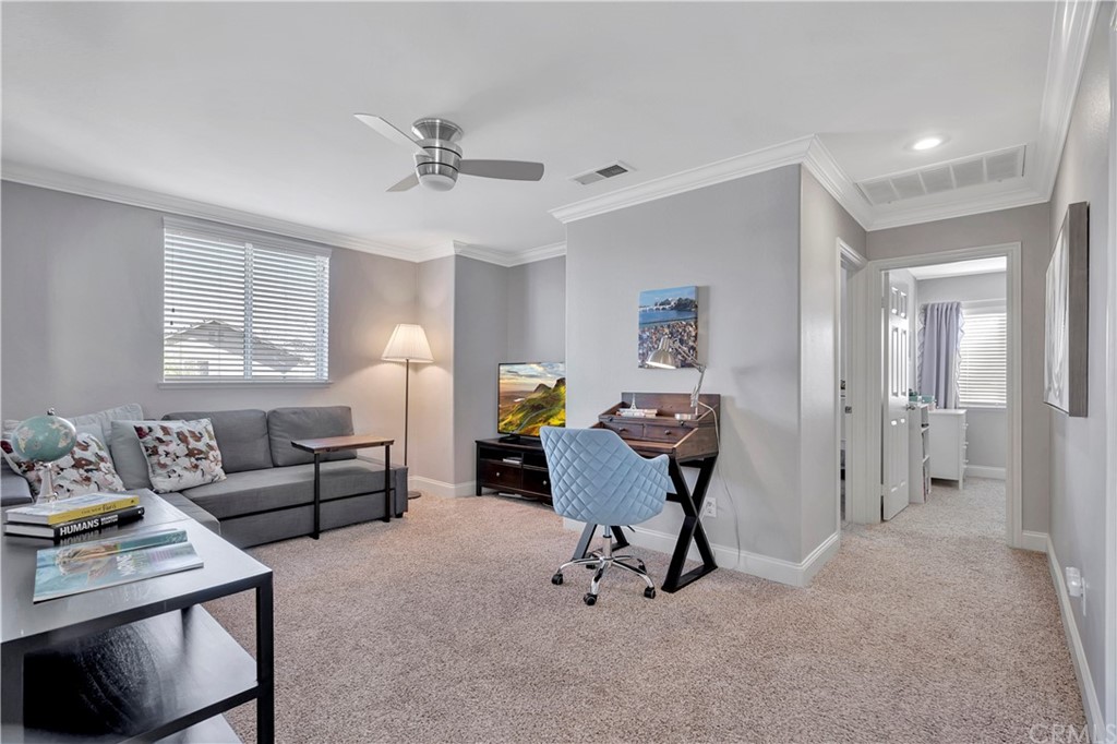 350 Exeter Way Corona, CA 92882 - Photo 28 of 55 a living room with furniture and a window
