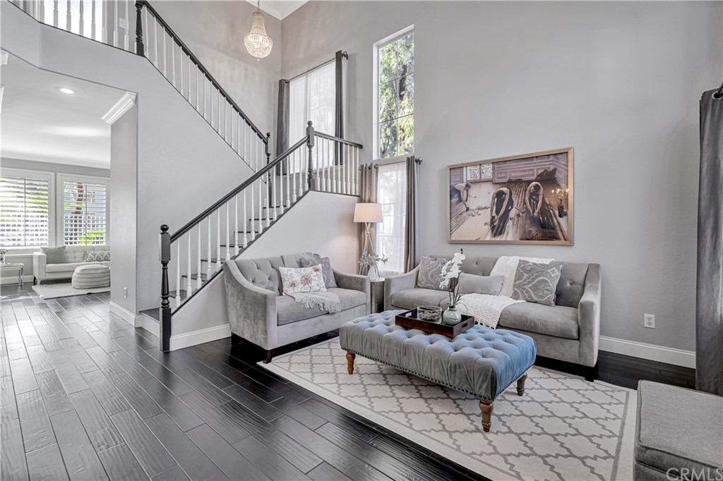 350 Exeter Way Corona, CA 92882 - Photo 3 of 55 a living room with furniture and a wooden floor