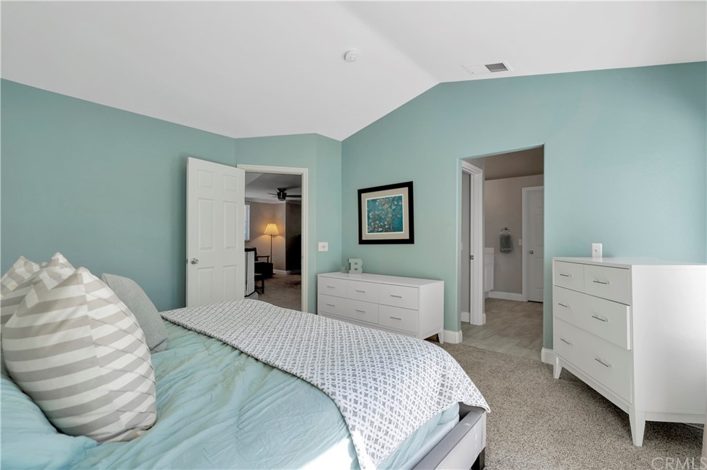 350 Exeter Way Corona, CA 92882 - Photo 37 of 55 a bedroom with a bed and a dresser