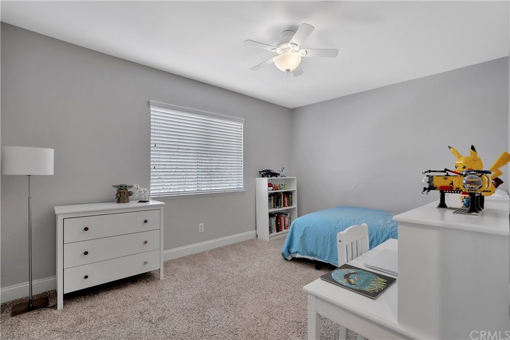 350 Exeter Way Corona, CA 92882 - Photo 38 of 55 a bedroom with furniture and a window