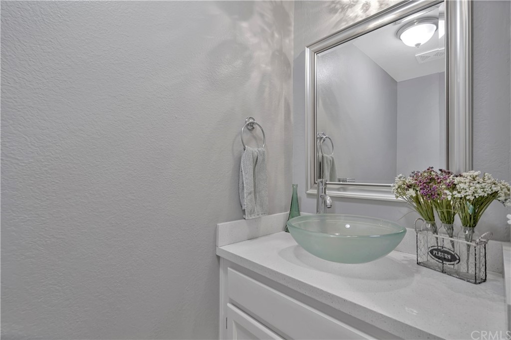 350 Exeter Way Corona, CA 92882 - Photo 41 of 55 a bathroom with a sink a vanity and a mirror