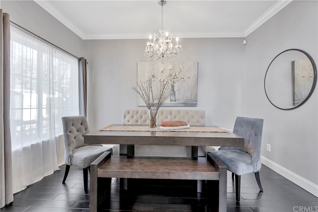 350 Exeter Way Corona, CA 92882 - Photo 44 of 55 a view of a dining room with furniture window and wooden floor
