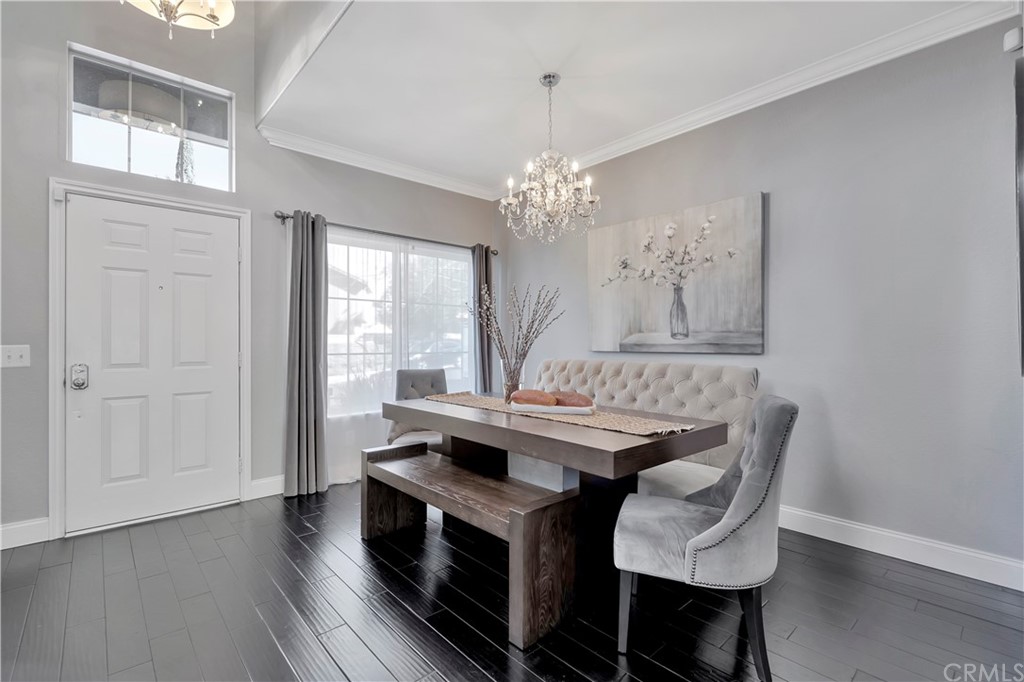 350 Exeter Way Corona, CA 92882 - Photo 45 of 55 a view of a dining room with furniture window and wooden floor