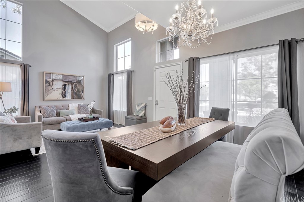350 Exeter Way Corona, CA 92882 - Photo 8 of 55 a living room with furniture and a chandelier