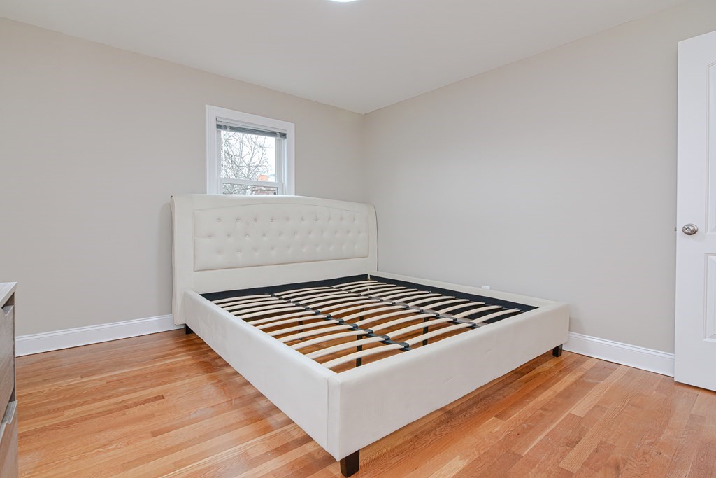 1059 Amostown Road West Springfield, MA 01089 - Photo 29 of 34 a view of a room with wooden floor and white walls