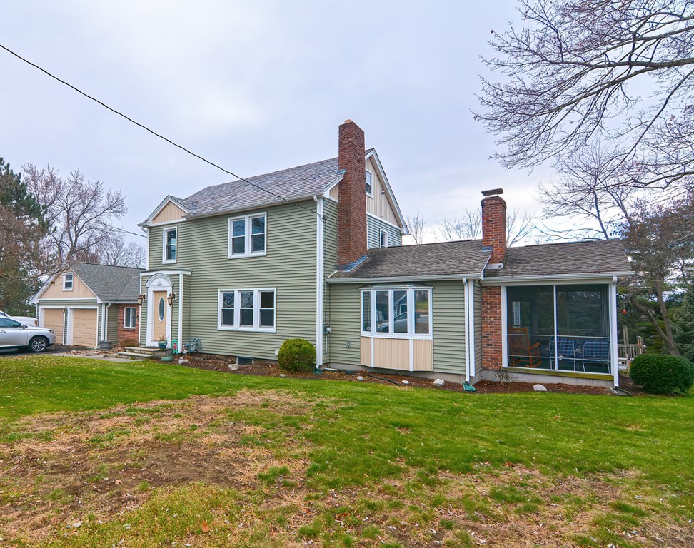 1059 Amostown Road West Springfield, MA 01089 - Photo 34 of 34 a front view of house with yard and green space