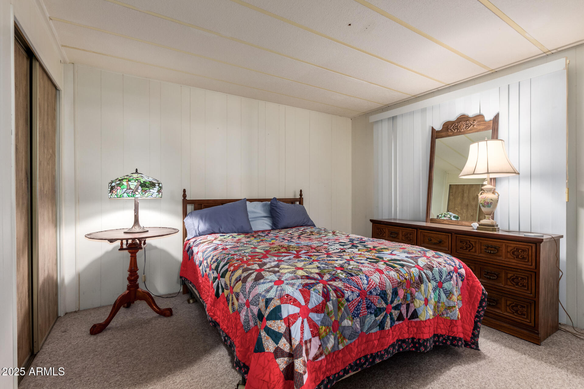 1888 South Goldfield Road Apache Junction, AZ 85119 - Photo 14 of 27 a bedroom with a bed and window