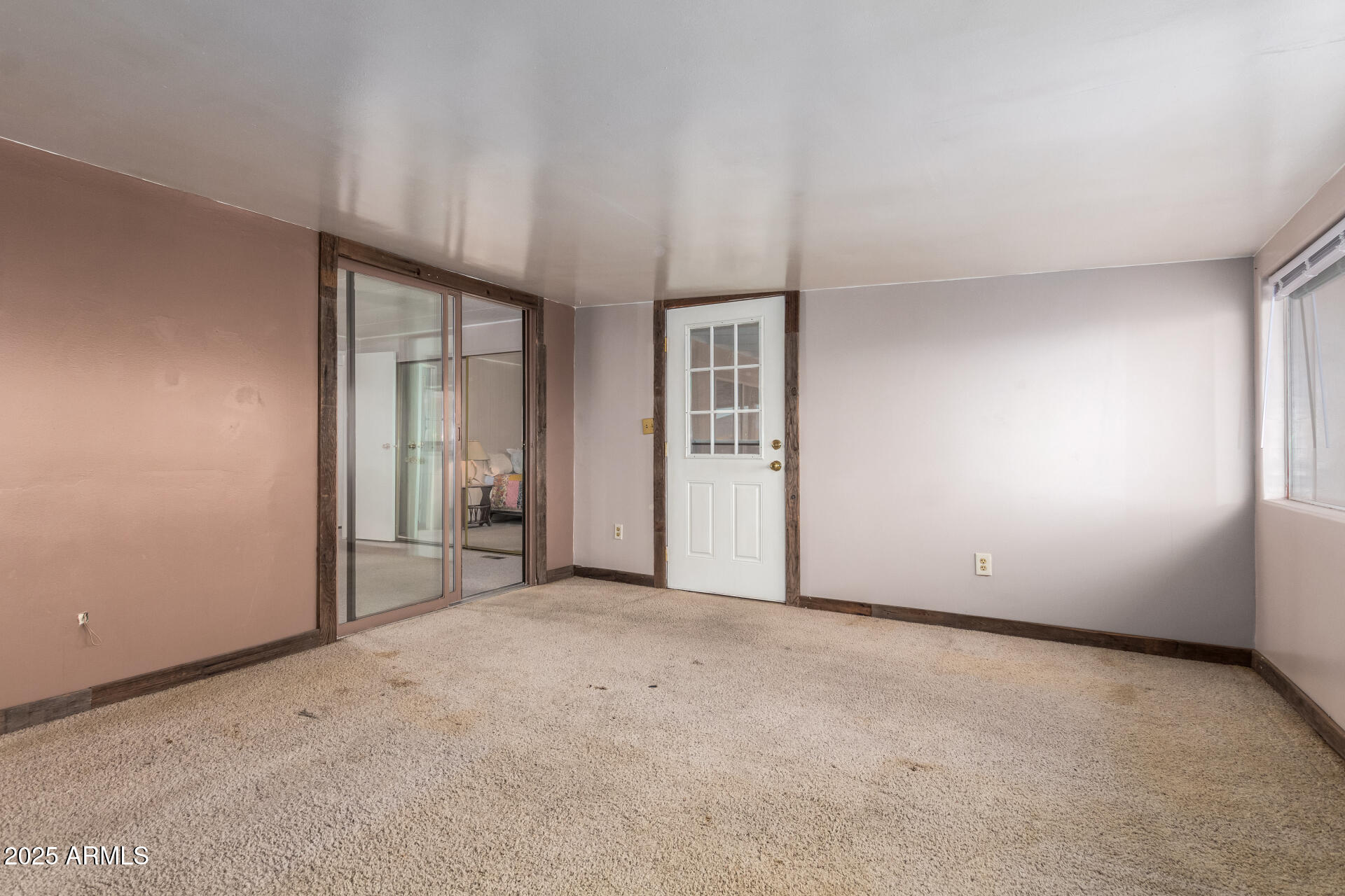 1888 South Goldfield Road Apache Junction, AZ 85119 - Photo 18 of 27 an empty room with closet and windows